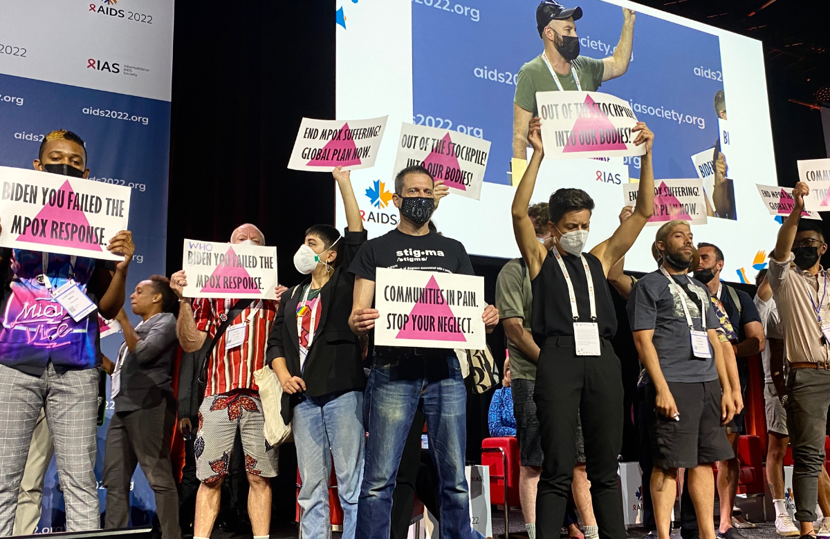 Protestors at AIDS 2022 demanding increased access to monkeypox vaccines and treatment. Photo by Liz Highleyman.