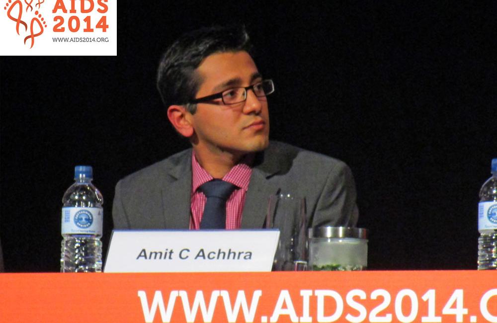 Amit Achhra, from the Kirby Institute in Sydney, presenting at AIDS 2014. Photo by Liz Highleyman, hivandhepatitis.com.