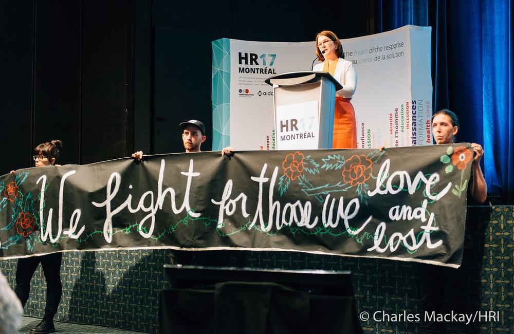Health Minister Jane Philpott and protestors at the HR17 opening ceremony © Charles Mackay / HRI