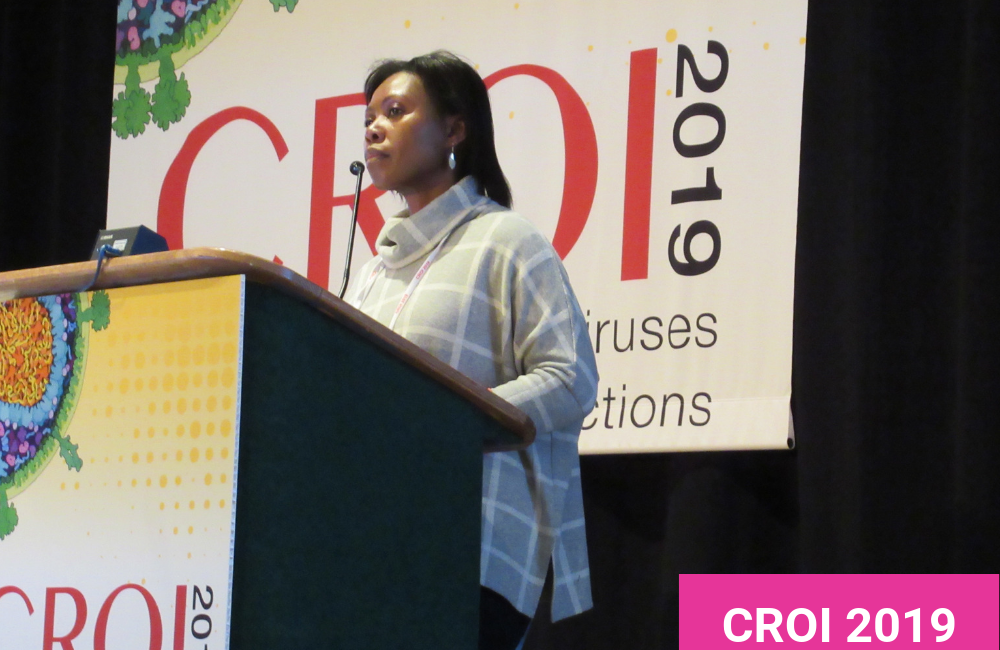 Sizulu Moyo presenting at CROI 2019. Photo by Roger Pebody.