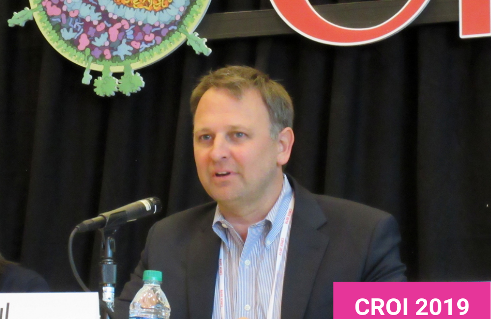 Paul Drain presenting at CROI 2019. Photo by Liz Highleyman.