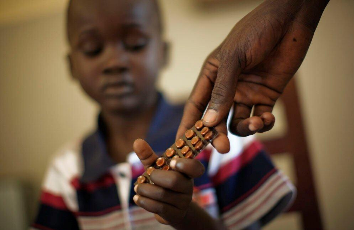 Child receiving tuberculosis medicine in South Sudan. UNDP South Sudan/Brian Sokol. Creative Commons licence. 