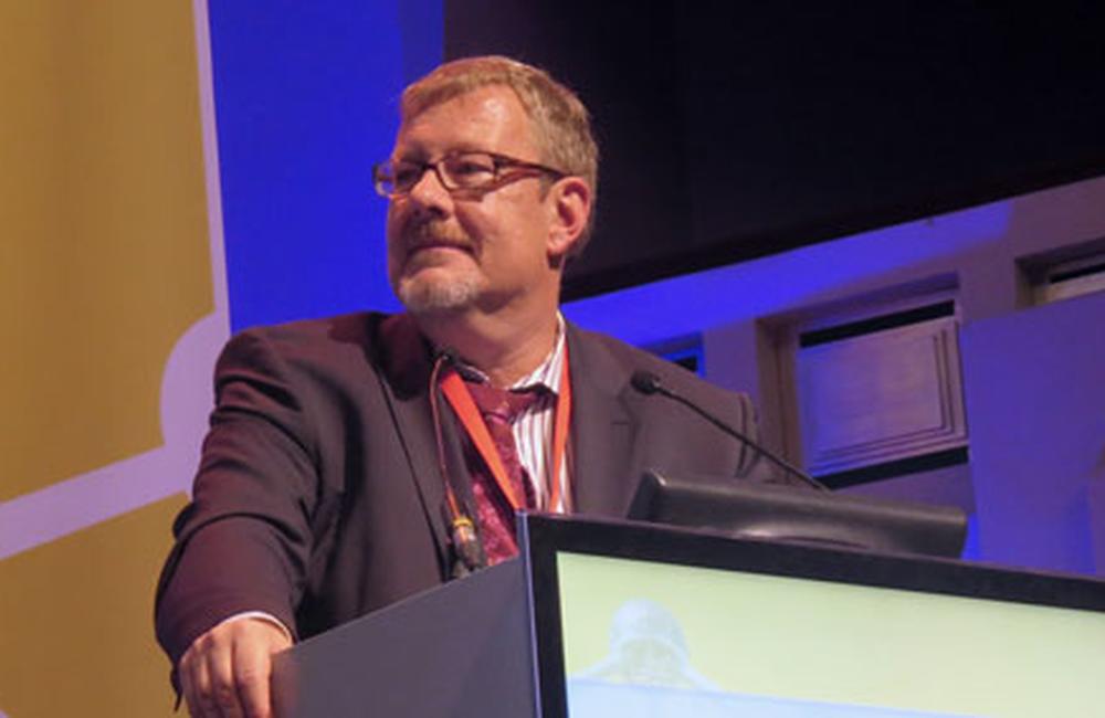 Jürgen Rockstroh, from the University of Bonn, speaking at EACS 2013. Photo by Liz Highleyman, hivandhepatitis.com