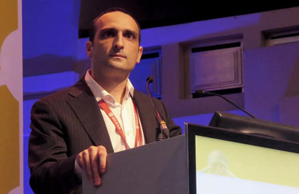 Patrick Ingiliz from the Medical Centre for Infectious Diseases, speaking at EACS 2013. Photo by Liz Highleyman, hivandhepatitis.com
