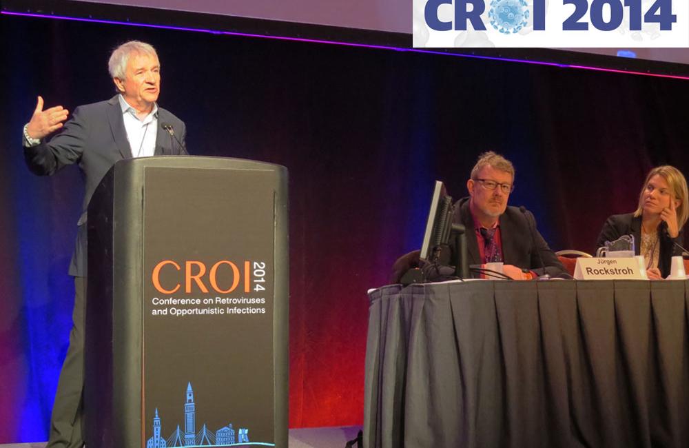 Trevor Hawkins, from the Southwest CARE Center in New Mexico, presenting at CROI 2014. Photo by Liz Highleyman, hivandhepatitis.com.