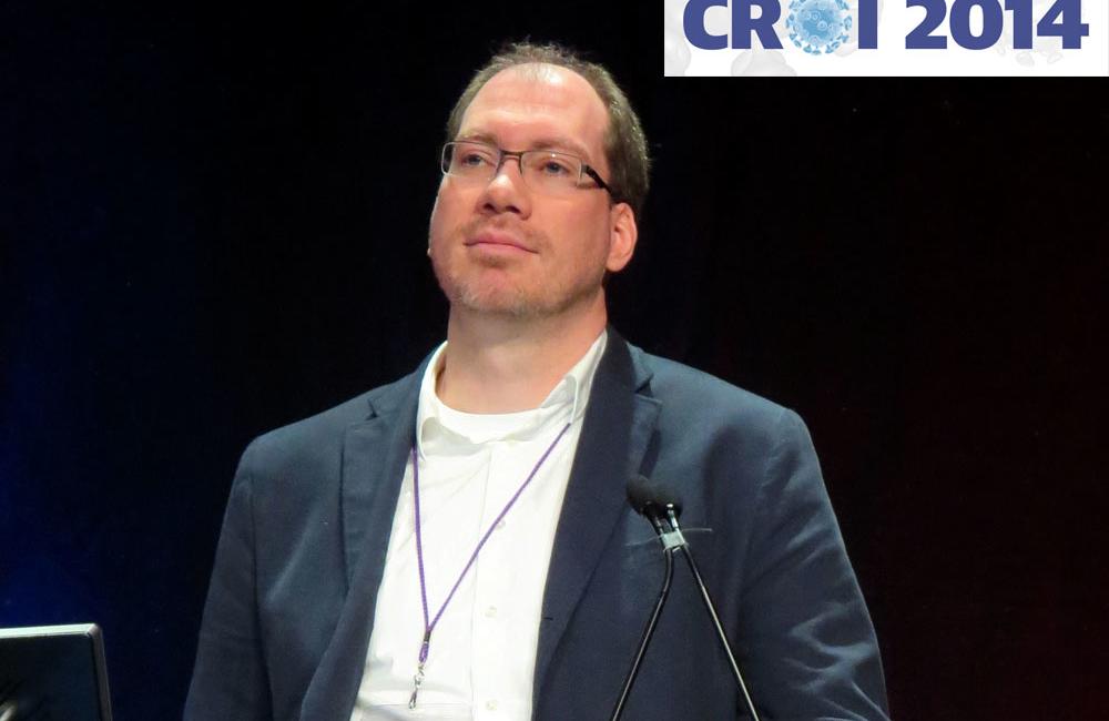 Timothy Henrich presenting at CROI 2014. Photo by Liz Highleyman, hivandhepatitis.com.