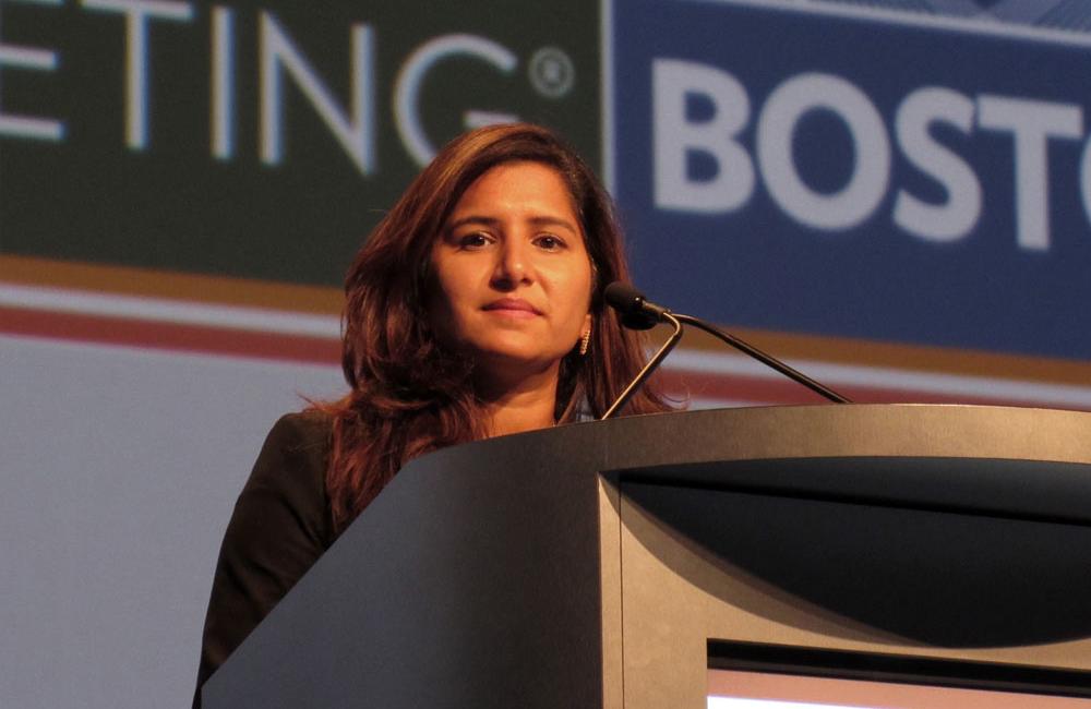 Anita Kohli, from the US National Institute of Allergy and Infectious Diseases (NIAID), speaking at the American Association for the Study of Liver Diseases (AASLD) Liver Meeting. Photo by Liz Highleyman, hivandhepatitis.com.