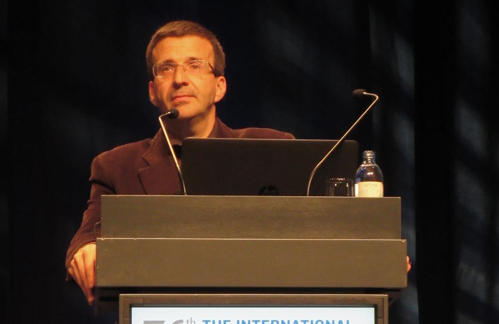 Dr Xavier Forns of Hospital Clinic, Barcelona, presents results of the C-SALVAGE study. Photo by Liz Highleyman, hivandhepatitis.com