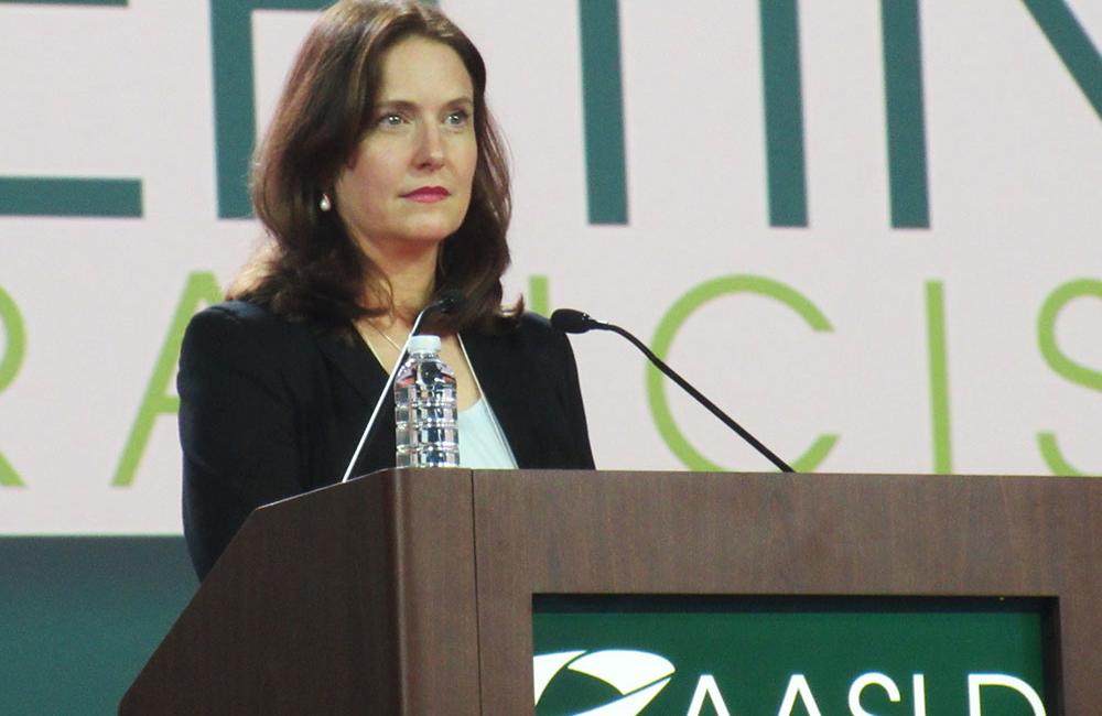 Tania Welzel, presenting at AASLD 2015. Photo by Liz Highleyman, hivandhepatitis.com