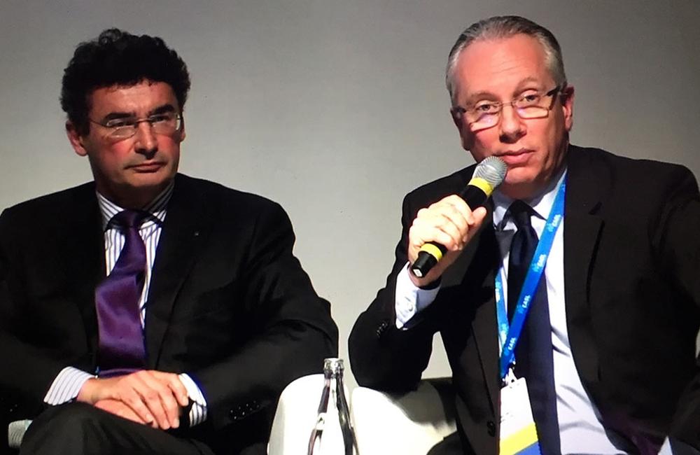 Laurent Castera and Jean-Michel Pawlotsky present the 2016 EASL treatment guidelines. Photo by Liz Highleyman, hivandhepatitis.com