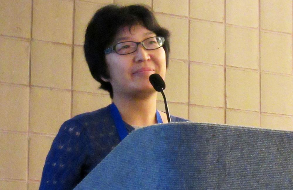 Xue Song, presenting at IDWeek 2016. Photo by Liz Highleyman, hivandhepatitis.com