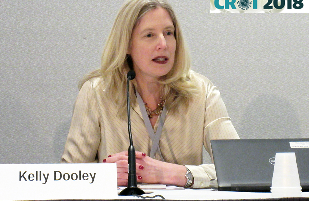 Kelly Dooley presenting at CROI 2018. Photo by Liz Highleyman.