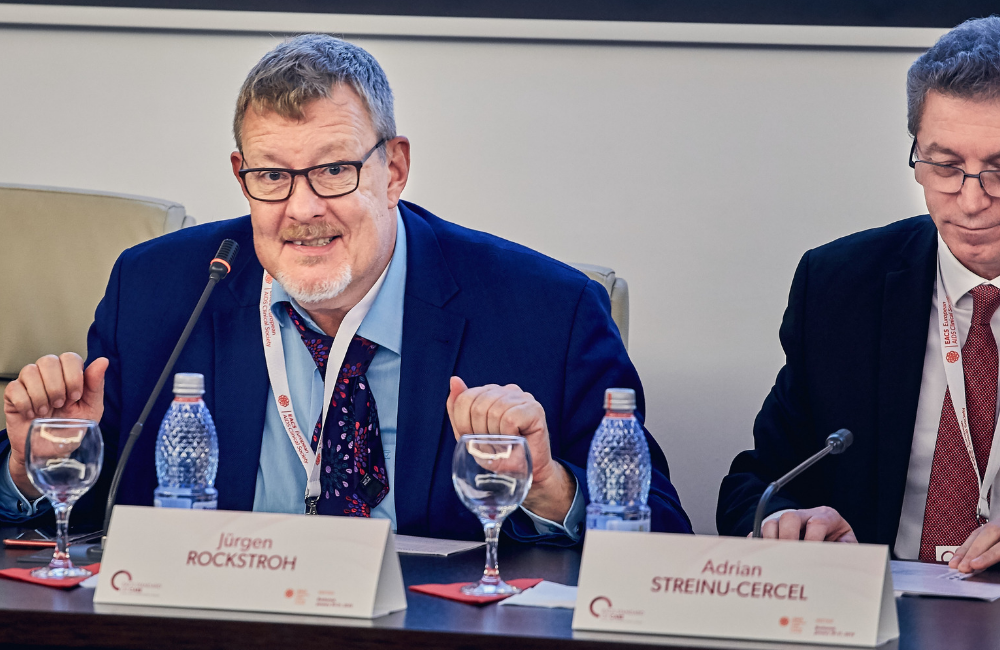 Jürgen Rockstroh and Adrian Streinu-Cercel at the Standard of Care meeting. Photo by Valentin Boboc.
