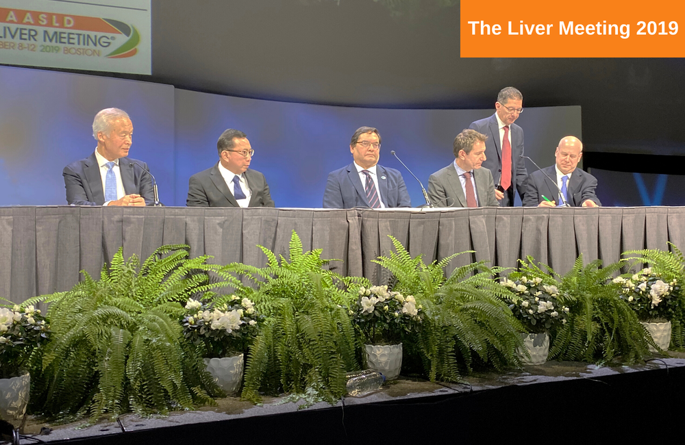 Liver association representatives signing the statement at The Liver Meeting 2019. Photo by Liz Highleyman.