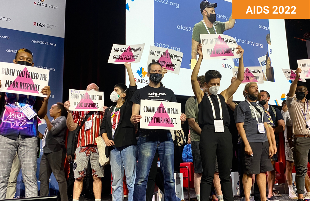 Protestors at AIDS 2022 demanding increased access to monkeypox vaccines and treatment. Photo by Liz Highleyman