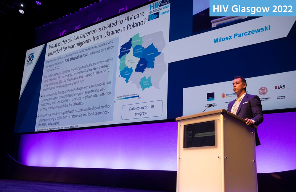 Dr Miłosz Parczewski presenting at HIV Glasgow 2022. Image by Alan Donaldson Photography.