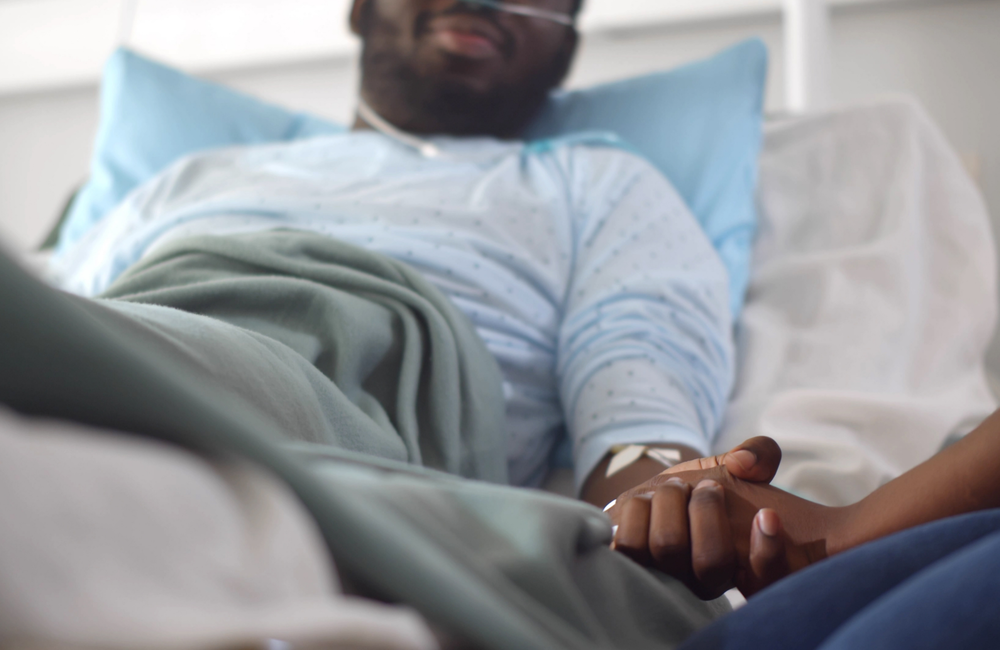 TommyStockProject/Shutterstock.com Man in a hospital bed.