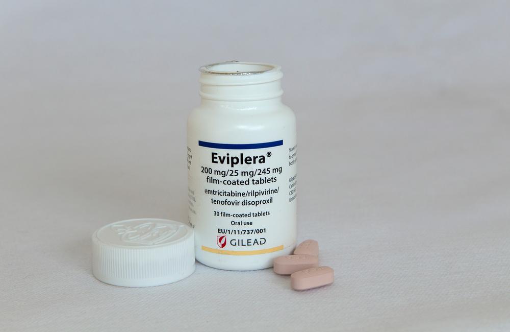 An open container of HIV medication.