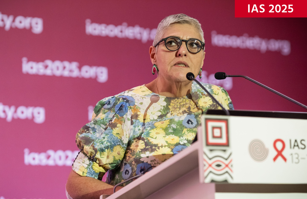 Dr Daniela Garone from Médecins Sans Frontieres at IAS 2025. Image: ©Papa Shabani/IAS. CC BY-SA 4.0. Dr Daniela Garone from Médecins Sans Frontieres at IAS 2025. She is talking into microphone at a podium.