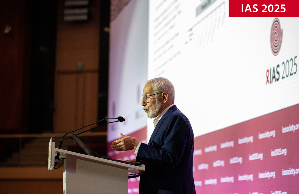 Professor Kenneth Mayer at IAS 2025. ©Jacques Nkinzingabo/IAS. CC BY-SA 4.0. Professor Kenneth Mayer at IAS 2025. He is wearing a dark suit and talking into a microphone at a podium.
