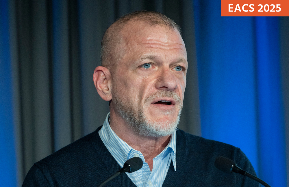 Kevin Moody presenting at EACS 2025. Kevin Moody talking in to a microphone at EACS 2025.