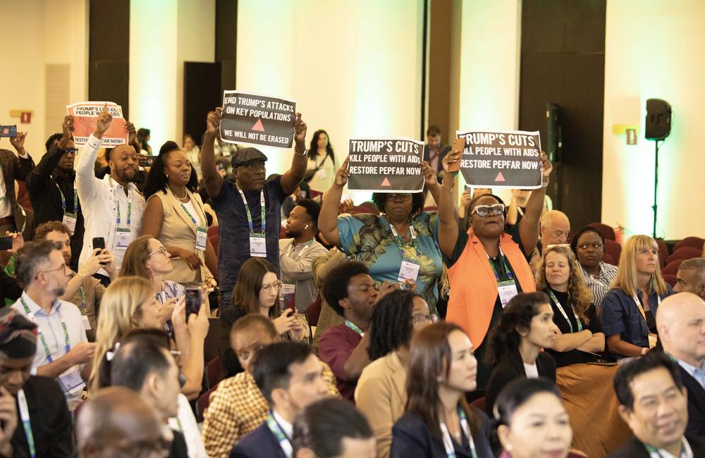 Activists protesting US AIDS Coordinator Jeff Graham at AIDS 2026.